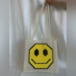 Fashion brand pearls bag women.